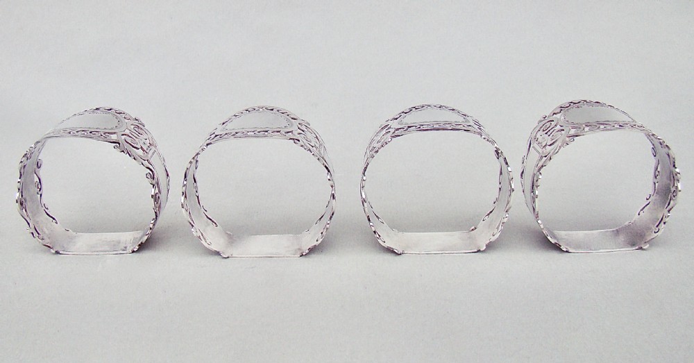 CASED SET OF FOUR EDWARDIAN SOLID SILVER NAPKIN RINGS BY COOPER BROTHERS, SHEFFIELD 1907 View IV