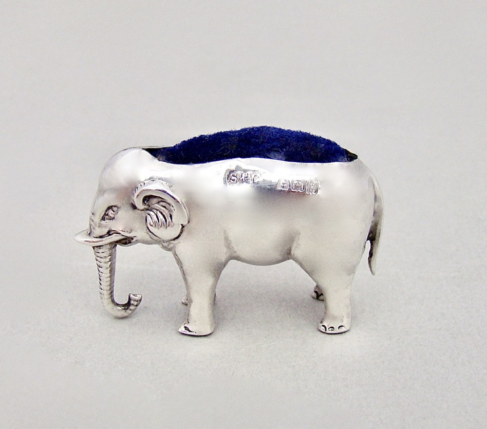 SMALL EDWARDIAN SILVER ELEPHANT PIN CUSHION BY SYDNEY & CO, BIRMINGHAM 1906