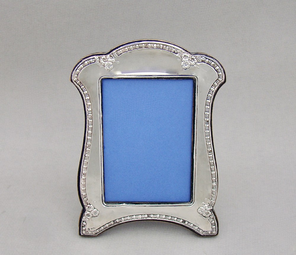DECORATIVE GEORGE V SOLID SILVER PHOTOGRAPH FRAME BY DEAKIN & SONS, BIRMINGHAM 1910