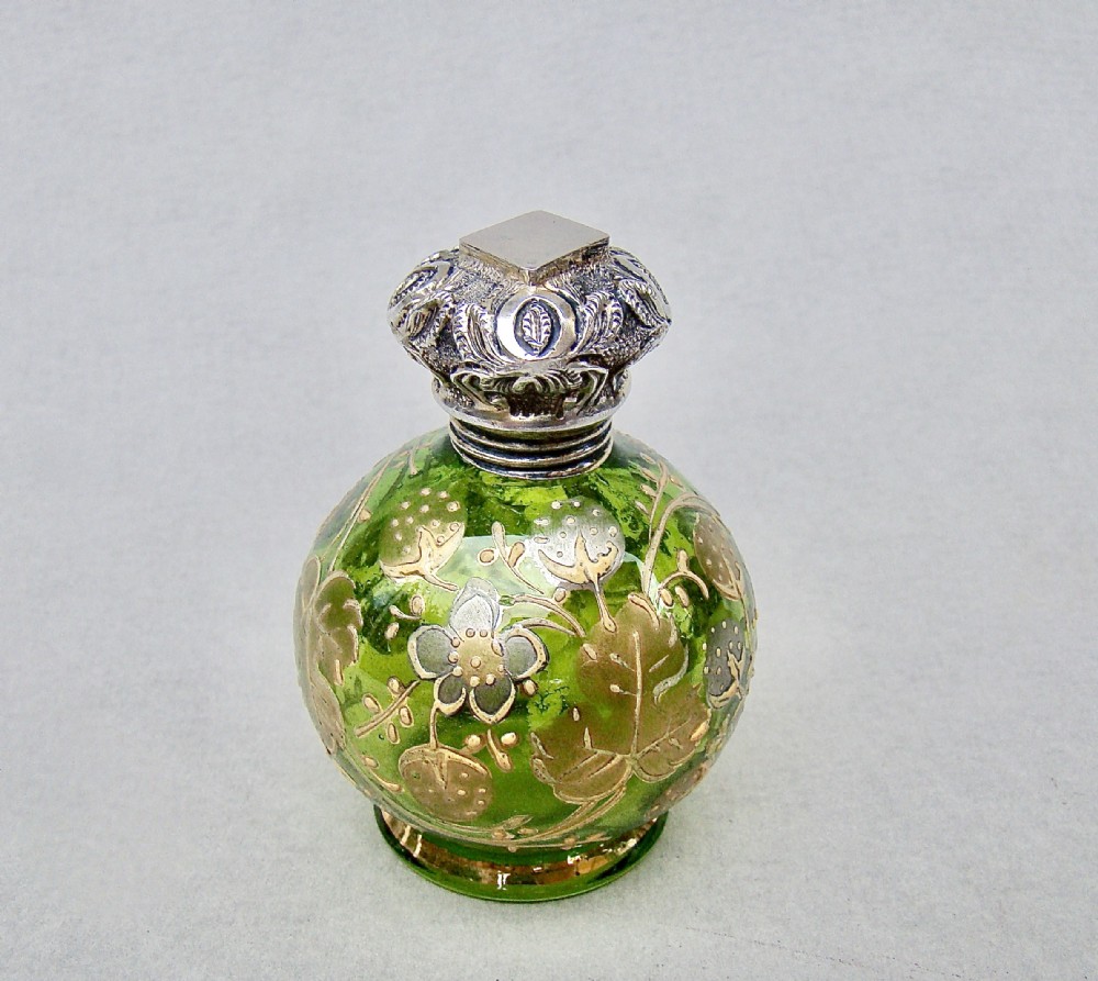 VICTORIAN SILVER MOUNTED GREEN AND GILT MOSER GLASS SCENT BOTTLE, CIRCA 1890