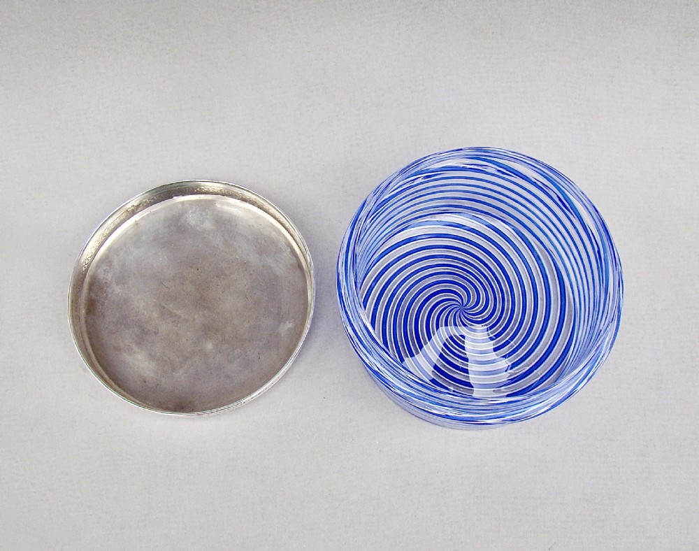 An oval blue and white spiralled glass vanity jar topped with a detailed engraved silver lid. View III