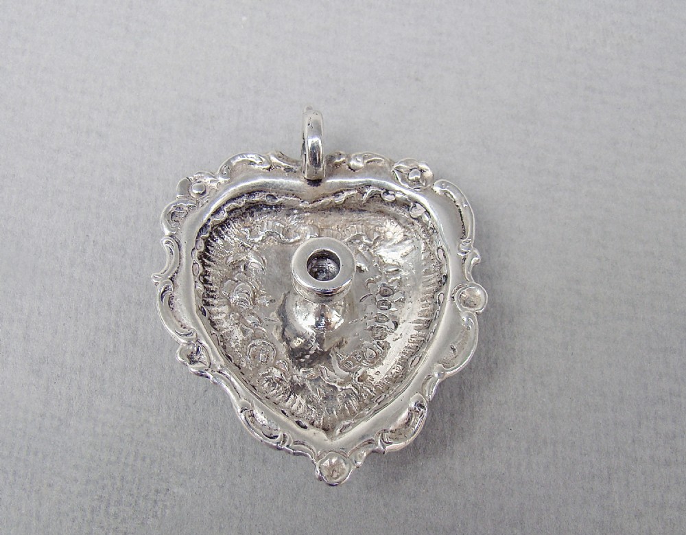EXQUISITE MINIATURE CAST SILVER CHAMBER STICK, IMPORT MARKS FOR LONDON 1894