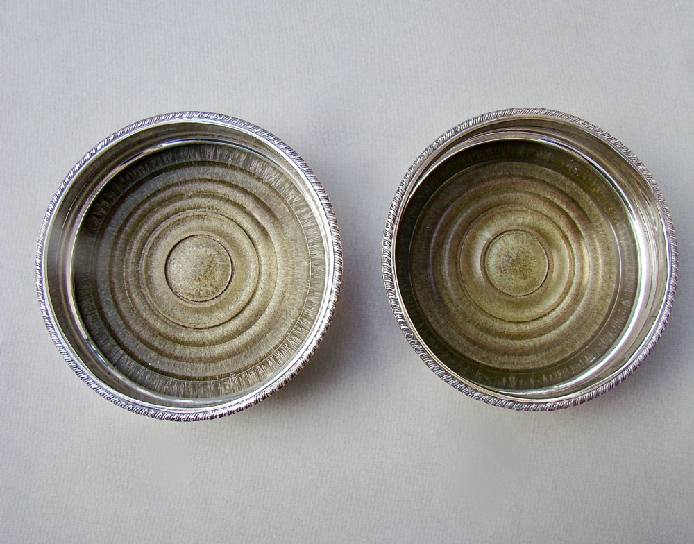 PAIR OF TURN OF THE CENTURY SILVER PLATED WINE COASTERS, CIRCA 1910 View IV