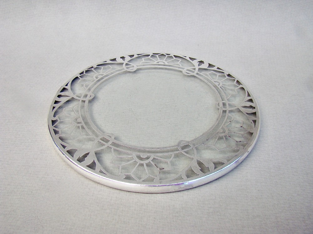 UNUSUAL SILVER MOUNTED GLASS TEAPOT STAND, CIRCA 1930 View II