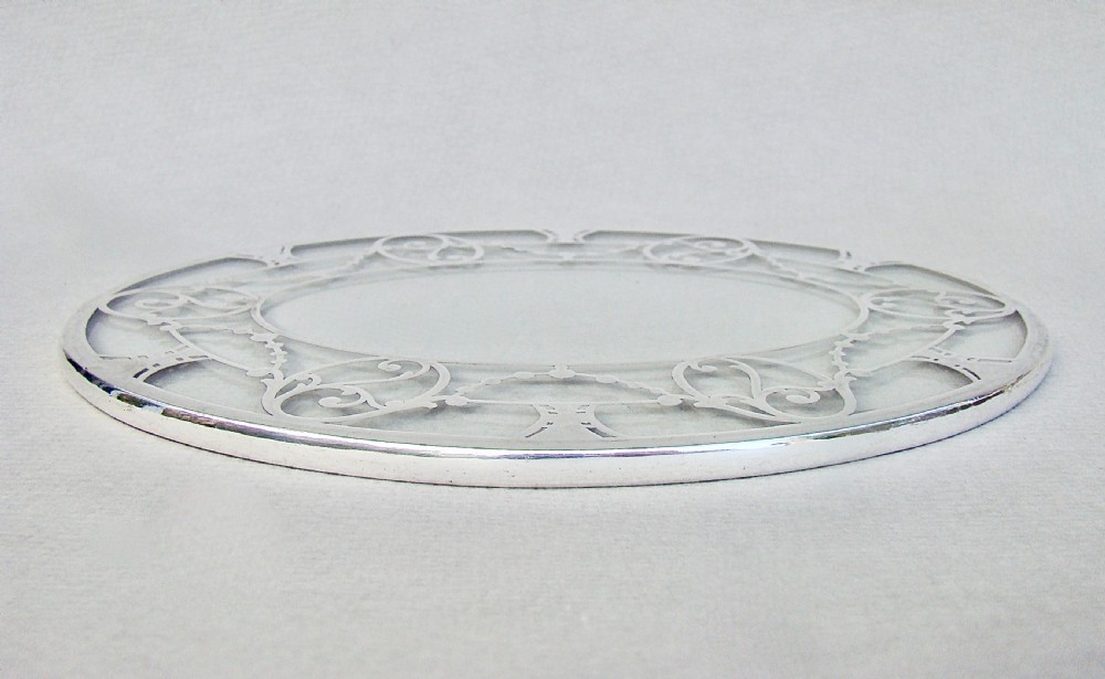 UNUSUAL SILVER MOUNTED OVAL GLASS TEAPOT STAND, CIRCA 1930 View II