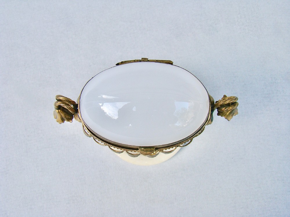 FRENCH PALAIS ROYAL EGG-SHAPED OPALINE GLASS CASKET WITH GILT ORMULU MOUNTS, CIRCA 1860 View IV