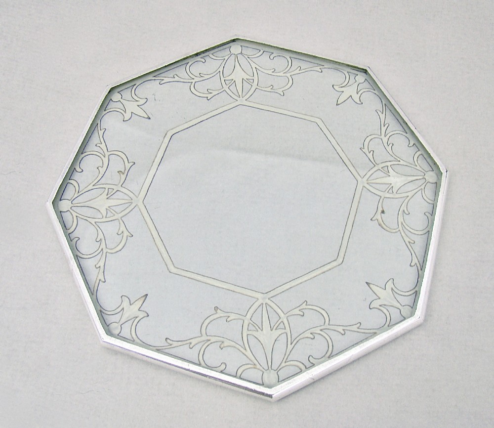 UNUSUAL OCTAGONAL SILVER MOUNTED OVAL GLASS TEAPOT STAND, CIRCA 1930 View III