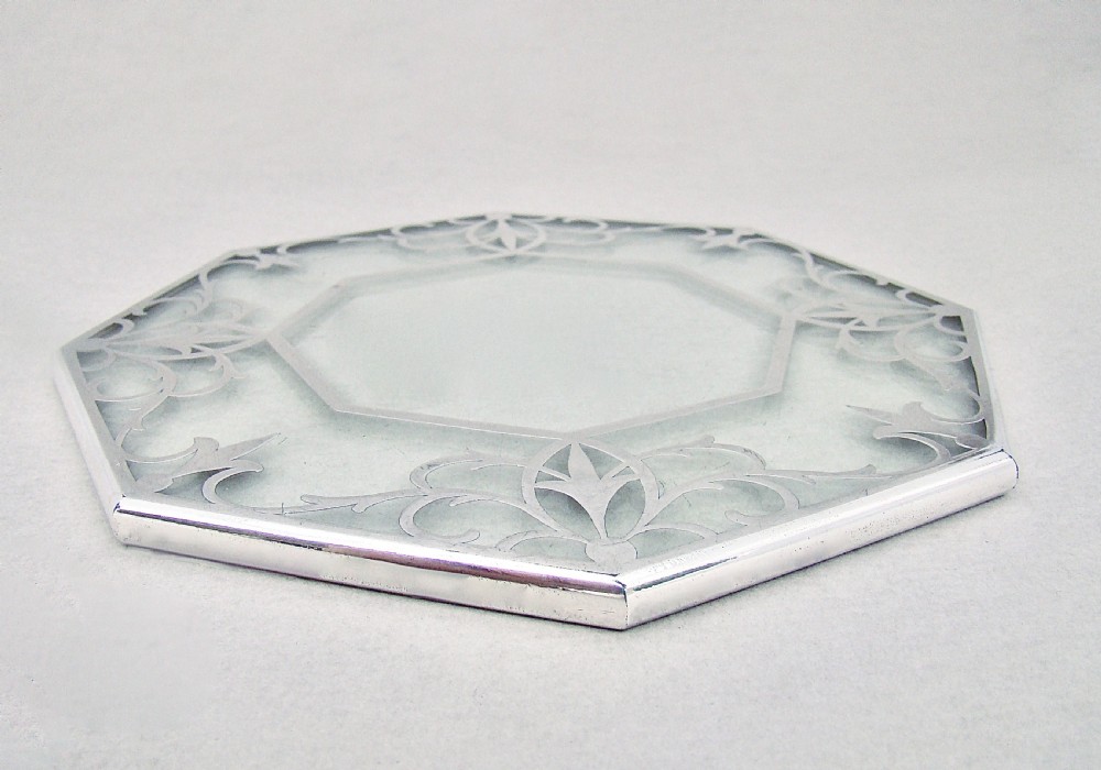 UNUSUAL OCTAGONAL SILVER MOUNTED OVAL GLASS TEAPOT STAND, CIRCA 1930 View IV