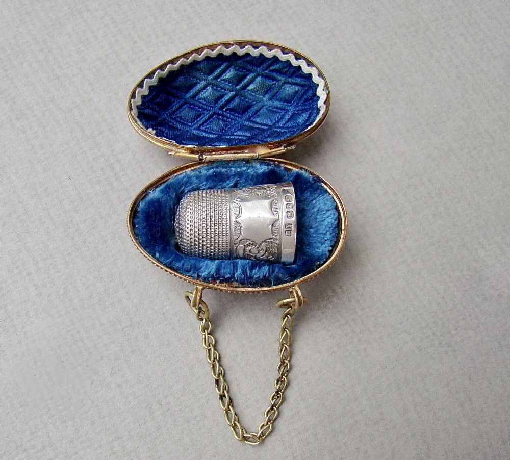 EXQUISITE VICTORIAN SOLID SILVER THIMBLE CASED IN ORMULU CHATELAINE EGG-SHAPED HOLDER
 View II