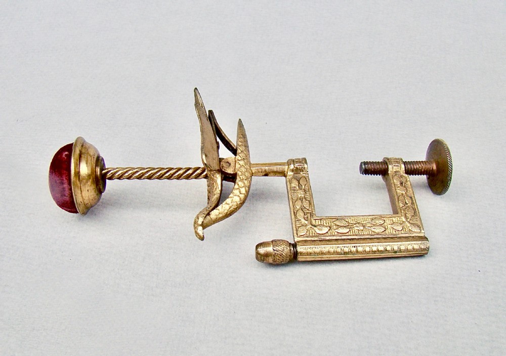 CHARMING VICTORIAN GILDED METAL HEMMING BIRD SEWING CLAMP & PIN CUSHION, CIRCA 1850 View V
