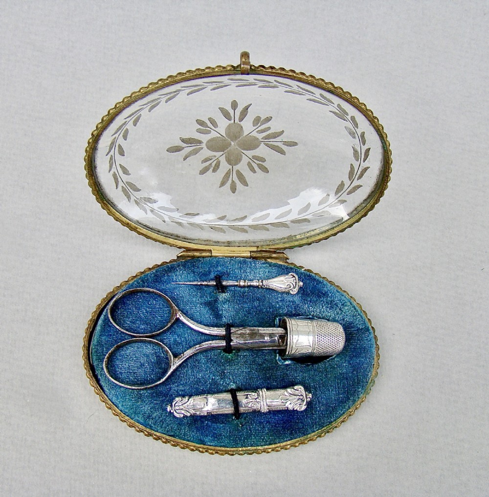 19TH CENTURY FRENCH SILVER FITTED SEWING COMPANION FOR A CHILD, CIRCA 1820