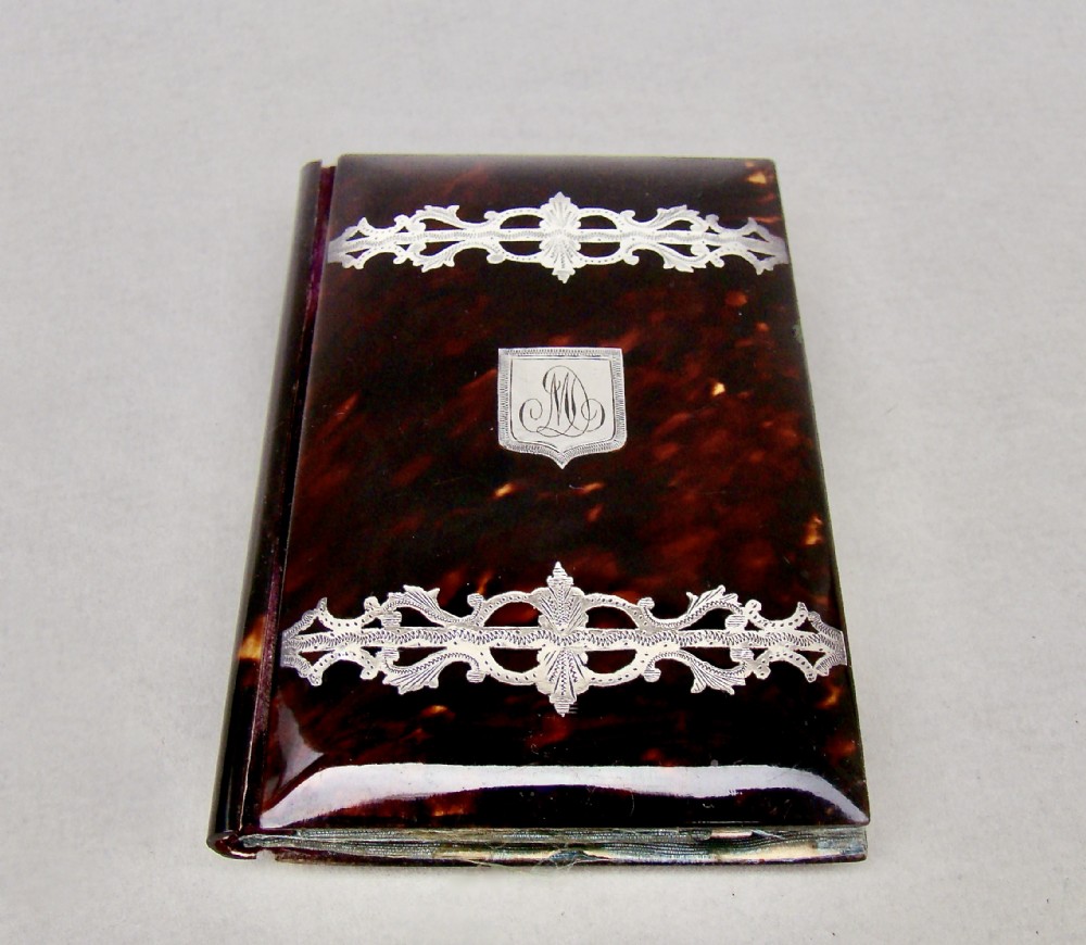 19TH CENTURY FRENCH SILVER INLAID TORTOISESHELL SOUVENIR NOTEBOOK, CIRCA 1880