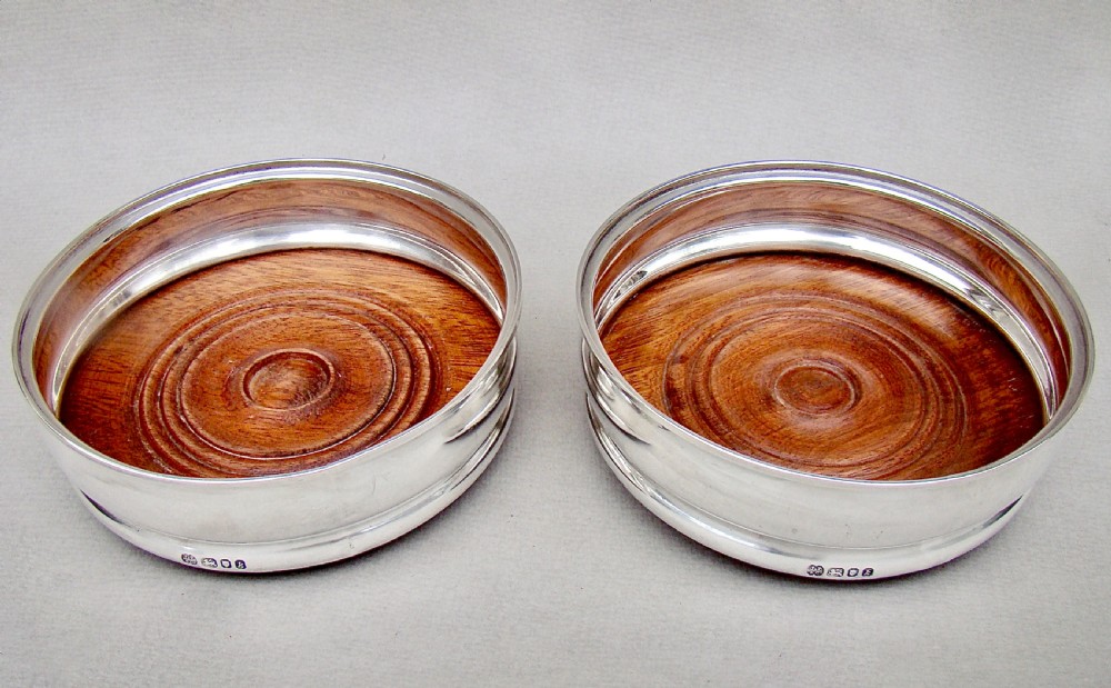 PAIR OF MID-CENTURY SOLID SILVER WINE COASTERS BY J. PARKES & CO, LONDON 1965. View III