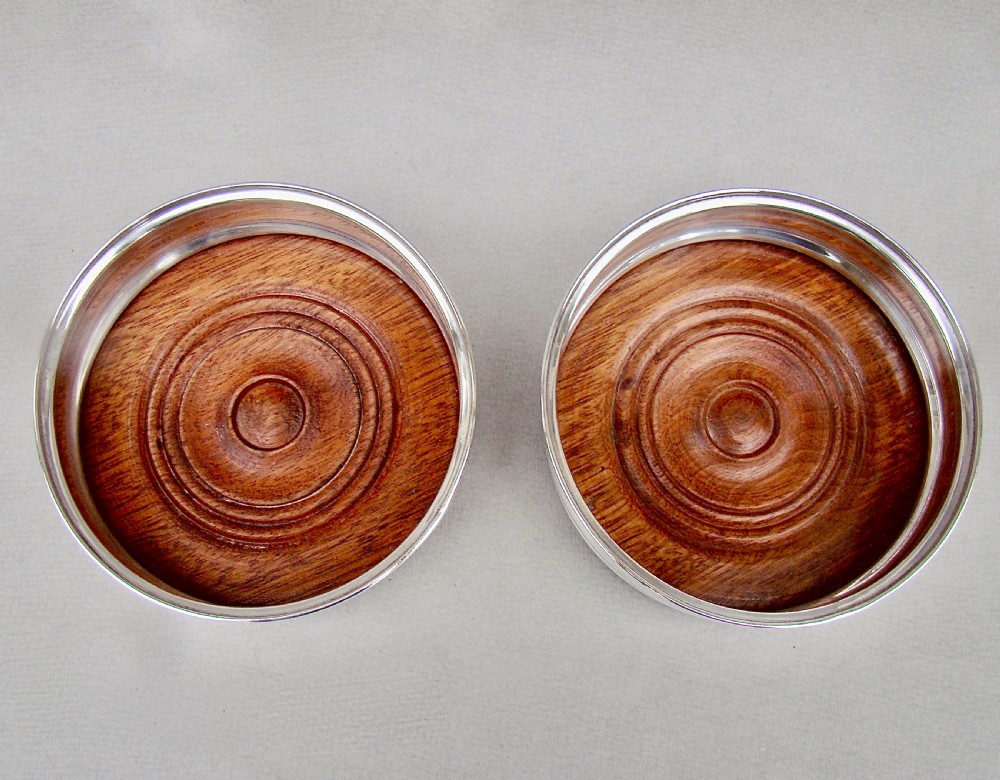 PAIR OF MID-CENTURY SOLID SILVER WINE COASTERS BY J. PARKES & CO, LONDON 1965. View IV