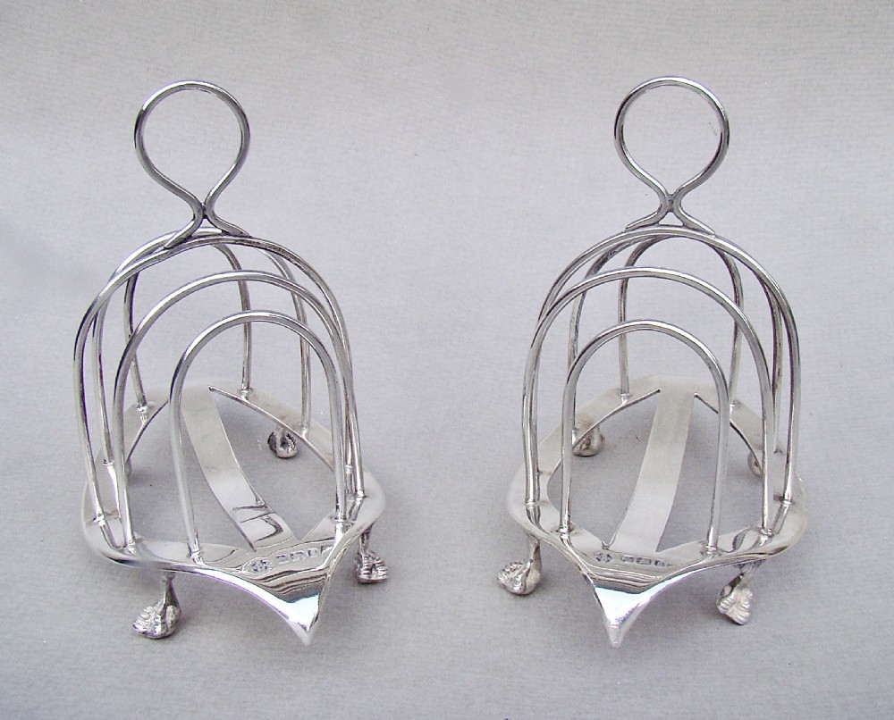 GOOD PAIR OF VICTORIAN SOLID SILVER TOAST RACKS BY WILLIAM HUTTON & SONS, SHEFFIELD 1899 View VIII