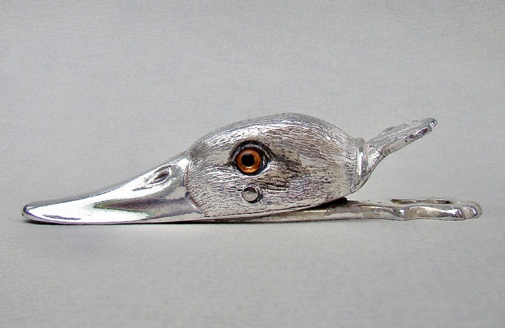 NOVELTY SILVER PLATED DUCK HEAD PAPER CLIP, CIRCA 1920
