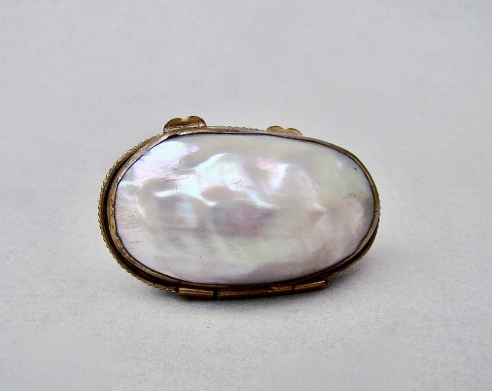 RARE 19TH C. MINIATURE SILVER THIMBLE FOR A CHILD IN MOTHER OF PEARL EGG-SHAPED CASE. View VI