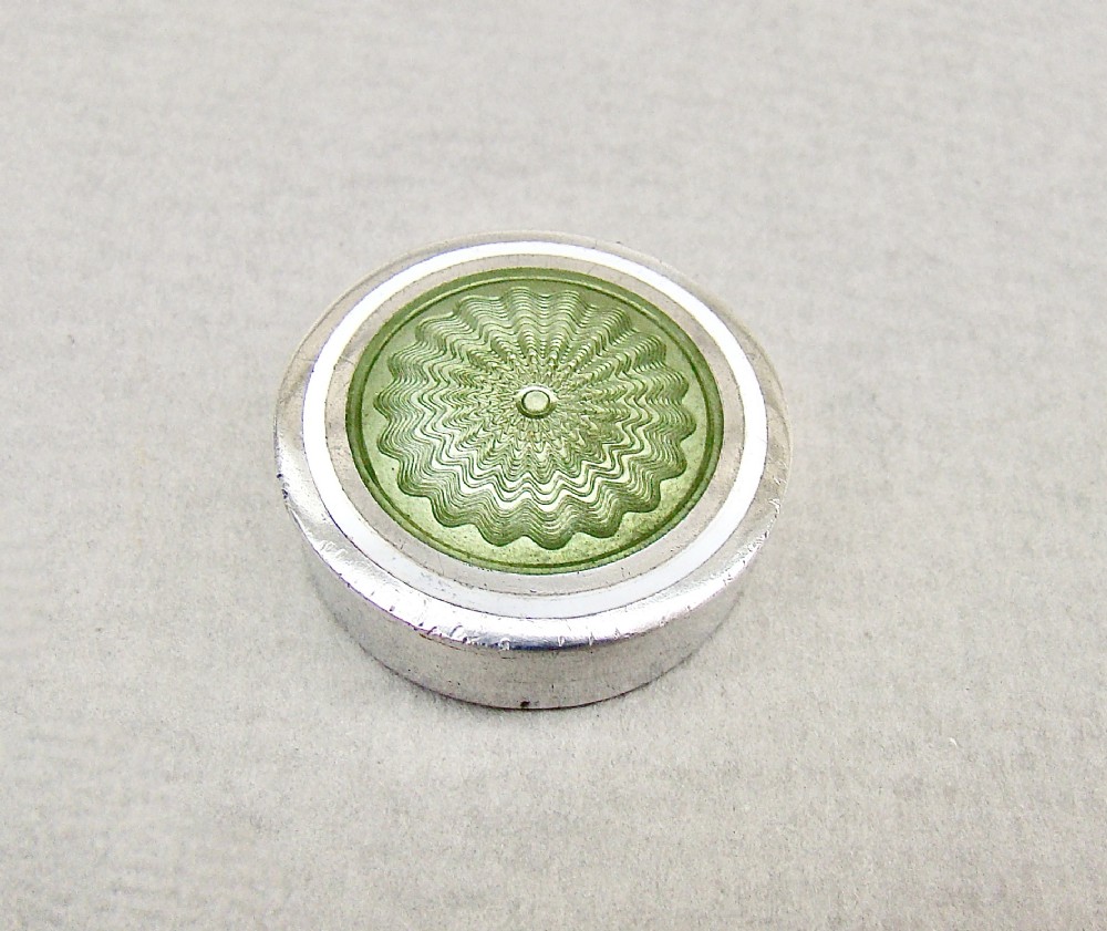 CONTINENTAL SILVER AND GUILLOCHE ENAMEL PILL BOX, CIRCA 1900

