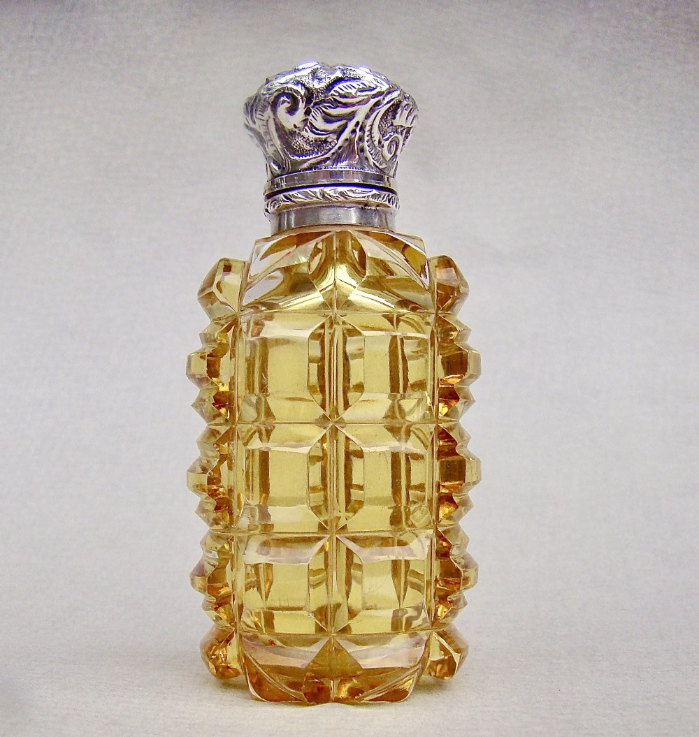 RARE AND EXQUISITE VICTORIAN SILVER AND AMBER GLASS SCENT BOTTLE, CIRCA 1890
