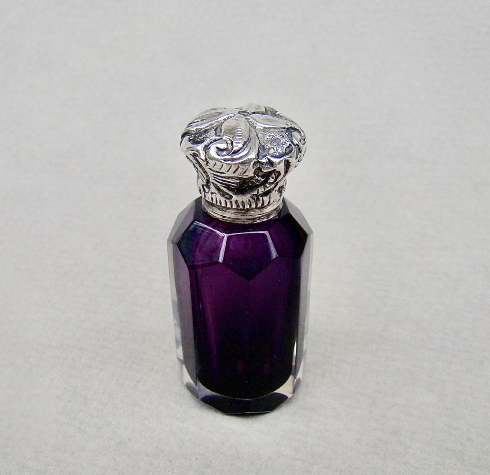 SMALL VICTORIAN SILVER & AMETHYST SLICED-CUT GLASS SCENT BOTTLE , CIRCA 1890