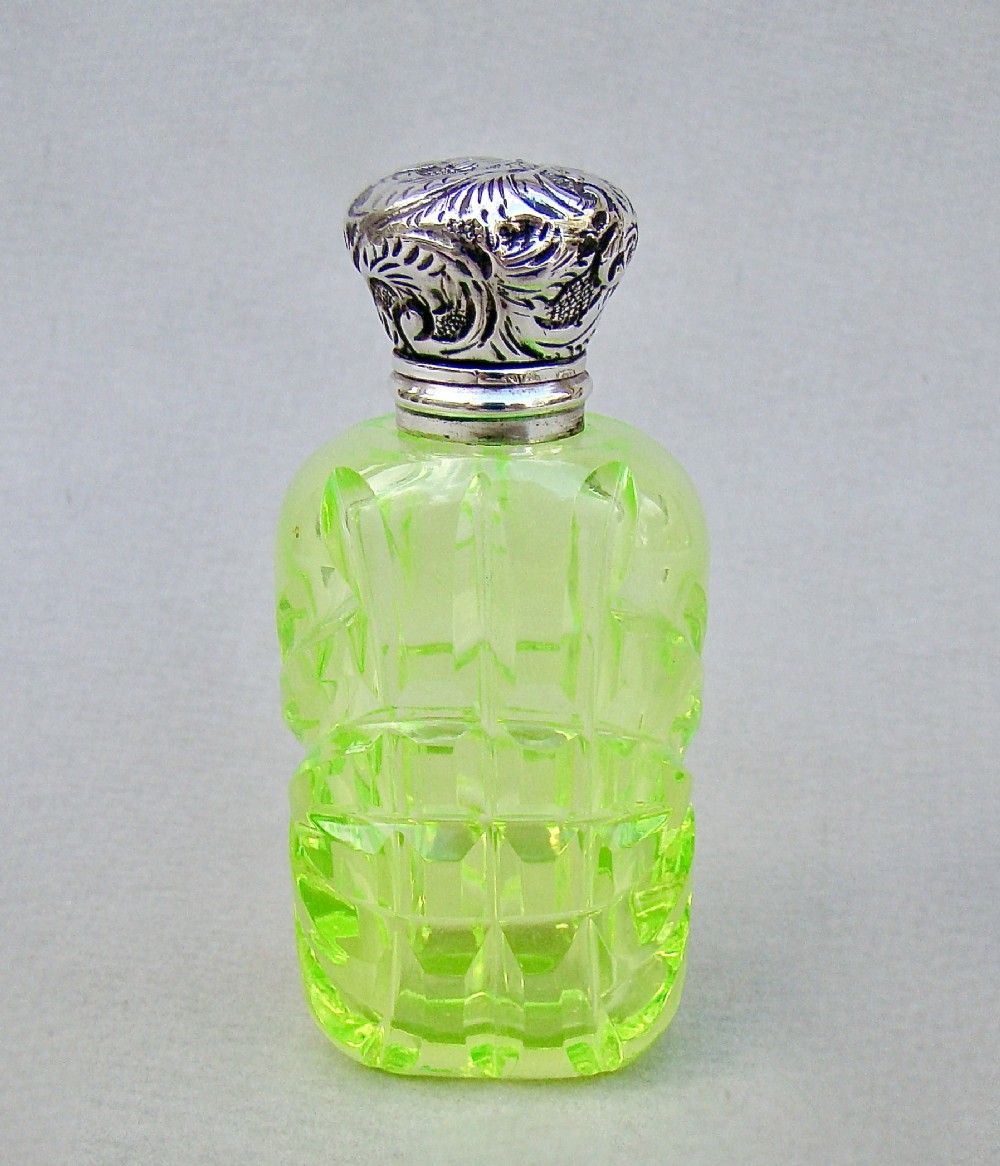 EXQUISITE VICTORIAN SILVER & SLICED-CUT URANIUM GLASS SCENT BOTTLE , CIRCA 1890
