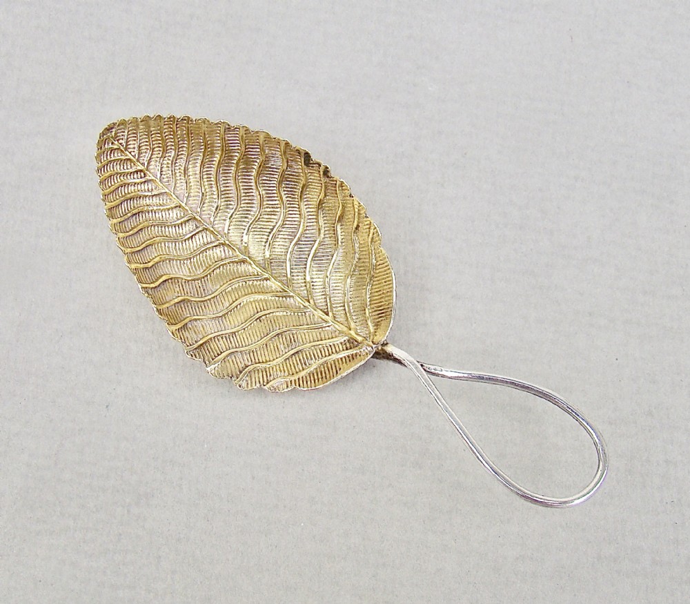 FABULOUS GEORGIAN SILVER-GILT LEAF CADDY SPOON BY ELIZABETH MORLEY, LONDON 1802