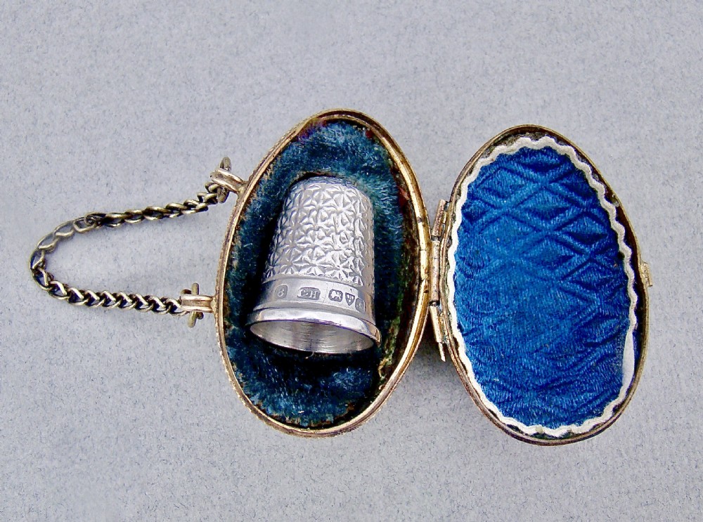 EXQUISITE CHARLES HORNER SILVER THIMBLE CASED IN ORMULU CHATELAINE EGG-SHAPED HOLDER
