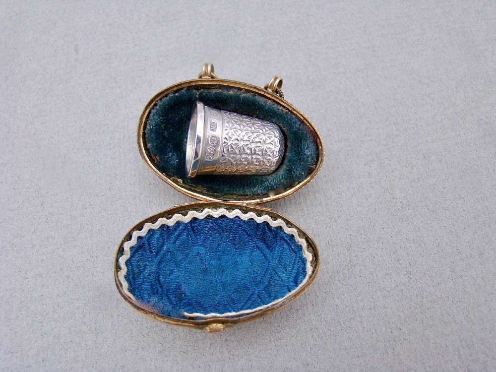 EXQUISITE CHARLES HORNER SILVER THIMBLE CASED IN ORMULU CHATELAINE EGG-SHAPED HOLDER
 View VI