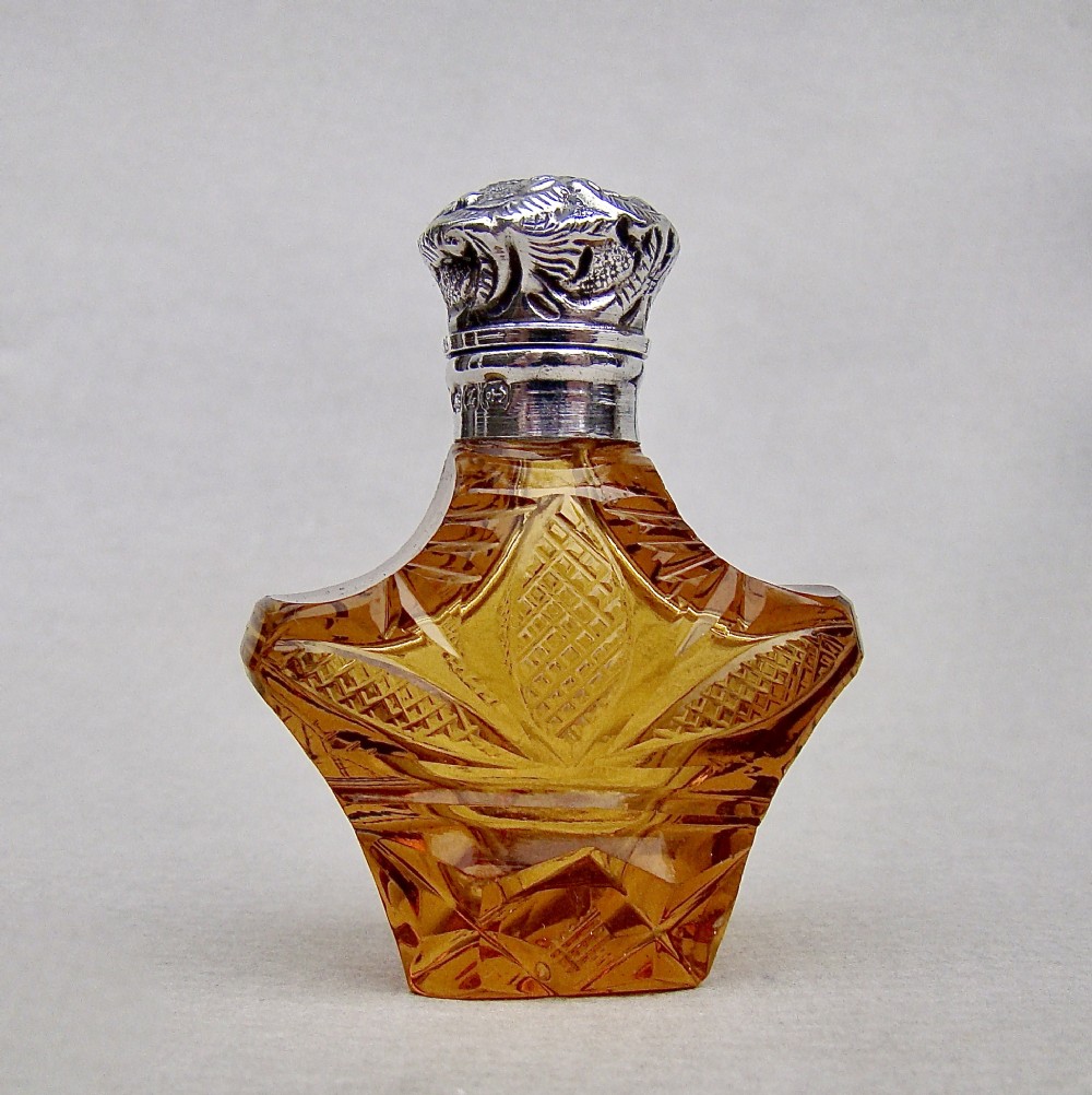 RARE VICTORIAN SILVER AND SLICED-CUT AMBER GLASS SCENT BOTTLE BY CHARLES MAY, BIRMINGHAM 1899