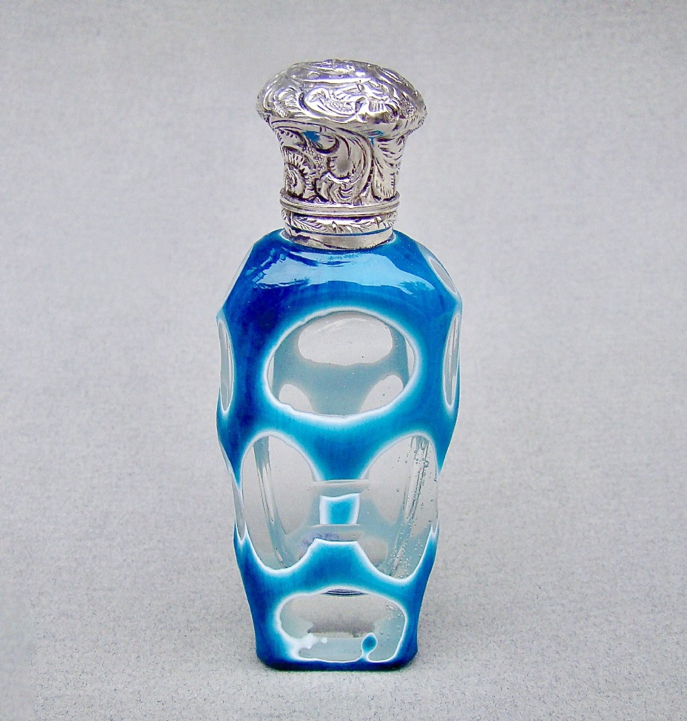 RARE VICTORIAN SILVER & BOHEMIAN TRIPLE CASED GLASS SCENT BOTTLE , CIRCA 1890