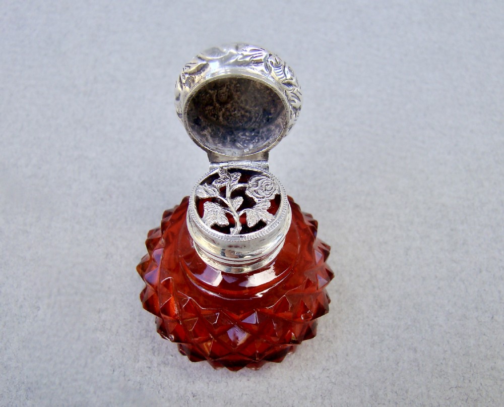 EXQUISITE VICTORIAN SILVER MOUNTED CRANBERRY GLASS VINAIGRETTE, CIRCA 1890