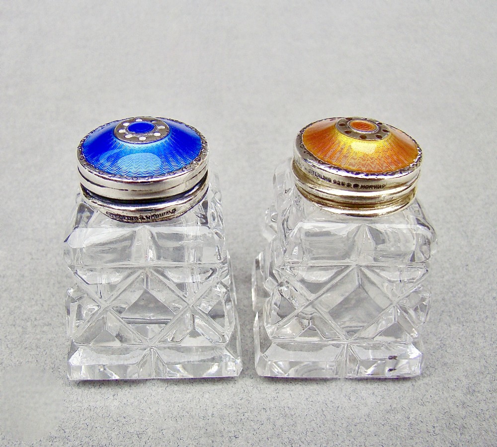 PAIR OF NORWEGIAN ART DECO SILVER AND ENAMEL SALTS, CIRCA 1930
