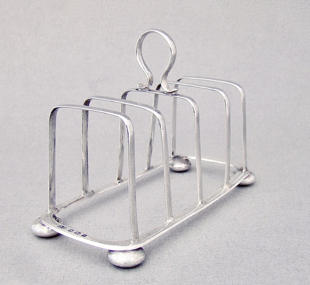 ELEGANT EDWARDIAN SILVER TOAST RACK BY JOSEPH GLOSTER, BIRMINGHAM 1908