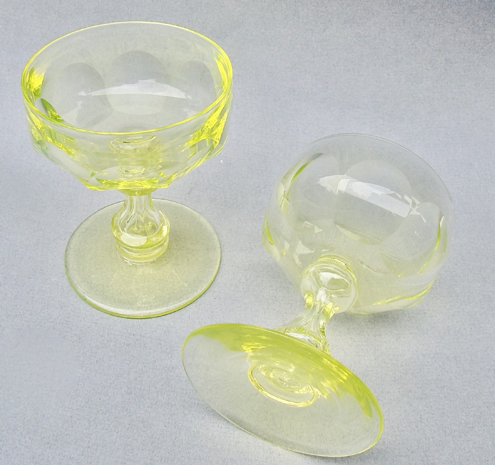 RARE PAIR OF VICTORIAN URANIUM GLASS CHAMPAGNE GLASSES, CIRCA 1890