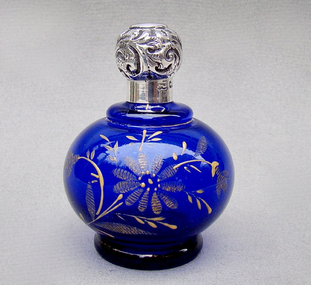 EDWARDIAN SILVER LIDDED BRISTOL BLUE ENAMELLED GLASS SCENT BOTTLE BY CHARLES MAY, BIRMINGHAM 1907