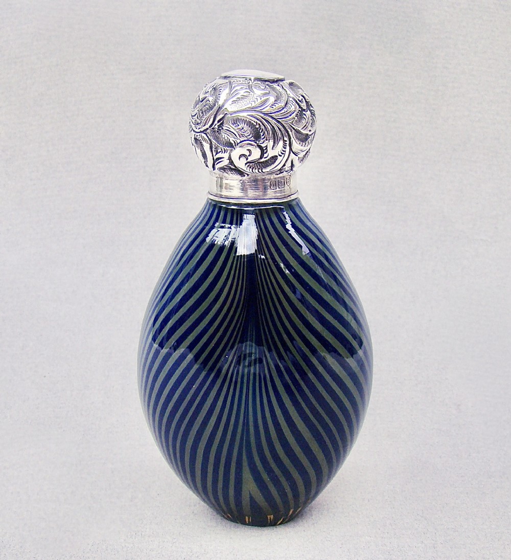 UNUSUAL 19TH CENTURY SILVER MOUNTED SWIRLY GLASS SCENT BOTTLE, LONDON 1908