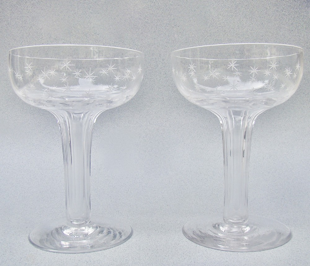 FABULOUS PAIR OF VICTORIAN STAR-ETCHED HOLLOW STEM CHAMPAGNE GLASSES, CIRCA 1880