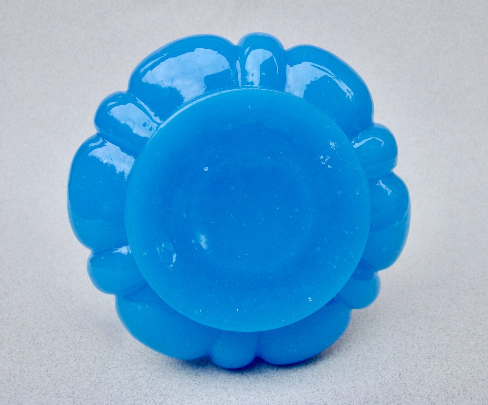 A bright blue lobed opaline glass scent bottle with a flared rim, ground glass stopper, and hand-gilded floral motifs. View VII
