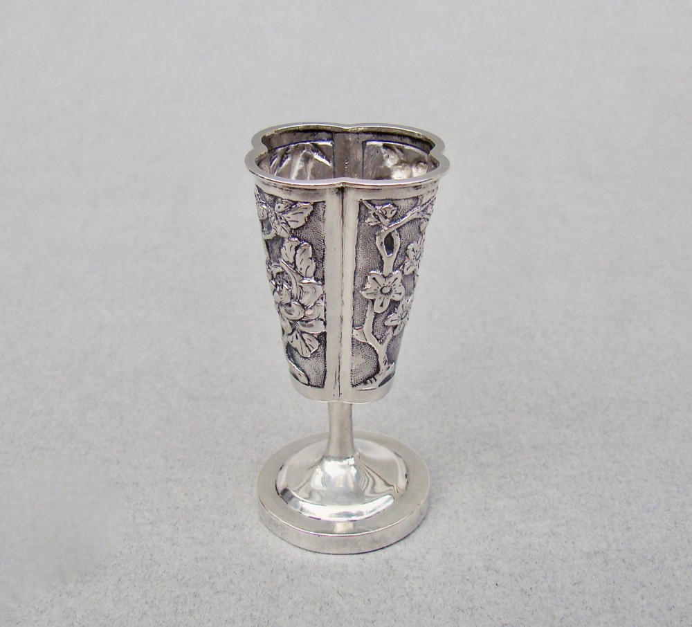 A 19th-century Chinese export silver toothpick holder featuring repousse bamboo motifs on a pedestal base with maker hallmarks stamped on the foot rim. View III