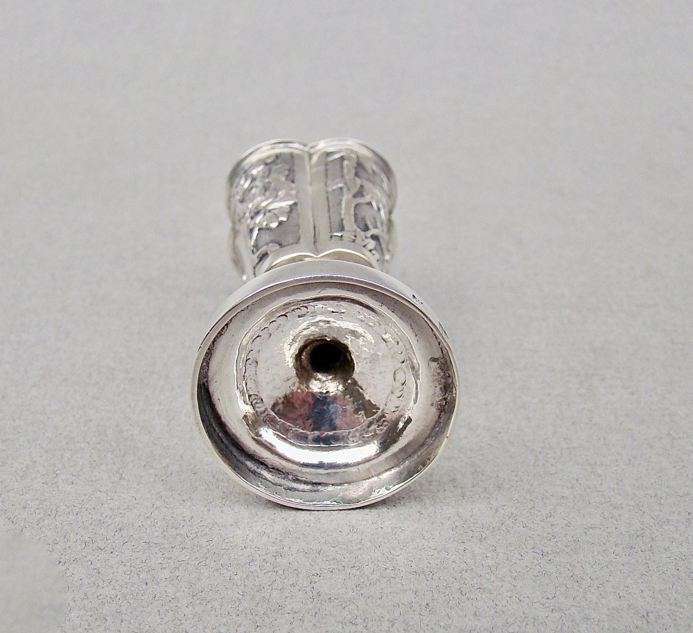 A 19th-century Chinese export silver toothpick holder featuring repousse bamboo motifs on a pedestal base with maker hallmarks stamped on the foot rim. View IV