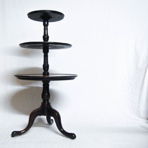 George III Period Cuban Mahogany Three Tire Dumb Waiter with Original Castors