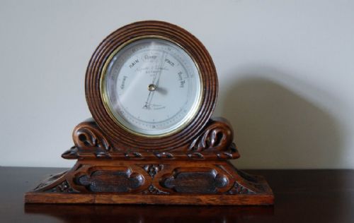 Early Victorian Brass Cased Desk Aneroid Barometer by Negretti & Zambra in Carved Oak Case