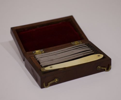 fig 1. William IV Cased Set of Seven Day Cut Throat Razors by Sansom Harwood & Co Sheffield