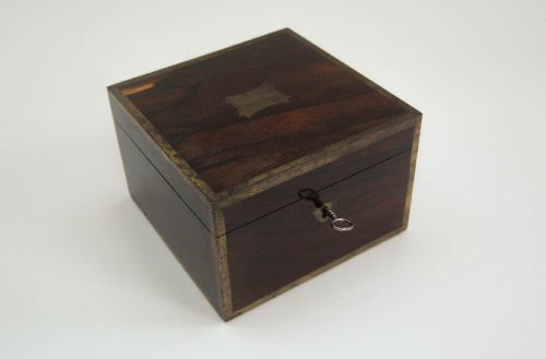 fig 2. Doctor Graham's Early Nineteenth Century Rosewood Cased Blood Letting Set