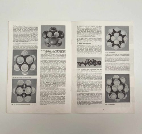 fig 9. A vintage wooden case filled with colourful plastic atomic model components, accompanied by an instructional booklet and a printed chart inside the lid.