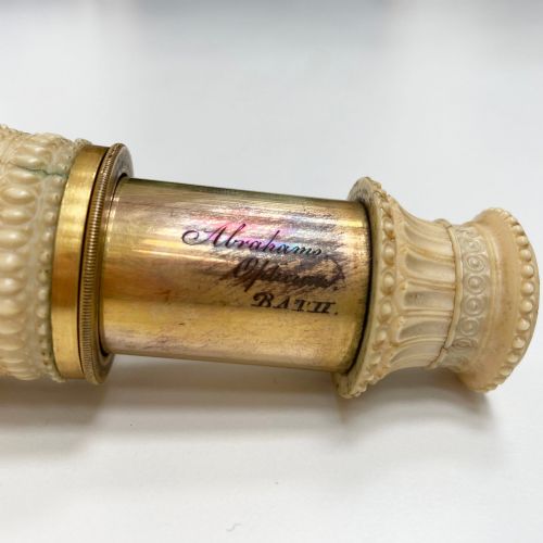 fig 1. Carved Ivory Monocular with Morocco Leather Case by Abraham of Bath