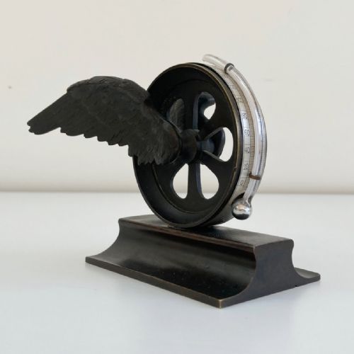 fig 1. Early Twentieth Century Winged Locomotive Wheel Desk Thermometer