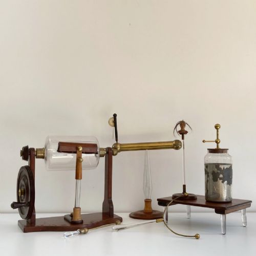 fig 1. Cased Nairne Pattern Electrostatic Machine with Accessories by George Adams of London