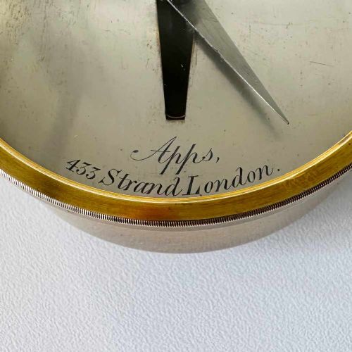 fig 4. A Victorian brass pocket galvanometer with a silvered dial housed inside a open dark leather protective case lined with blue velvet.
