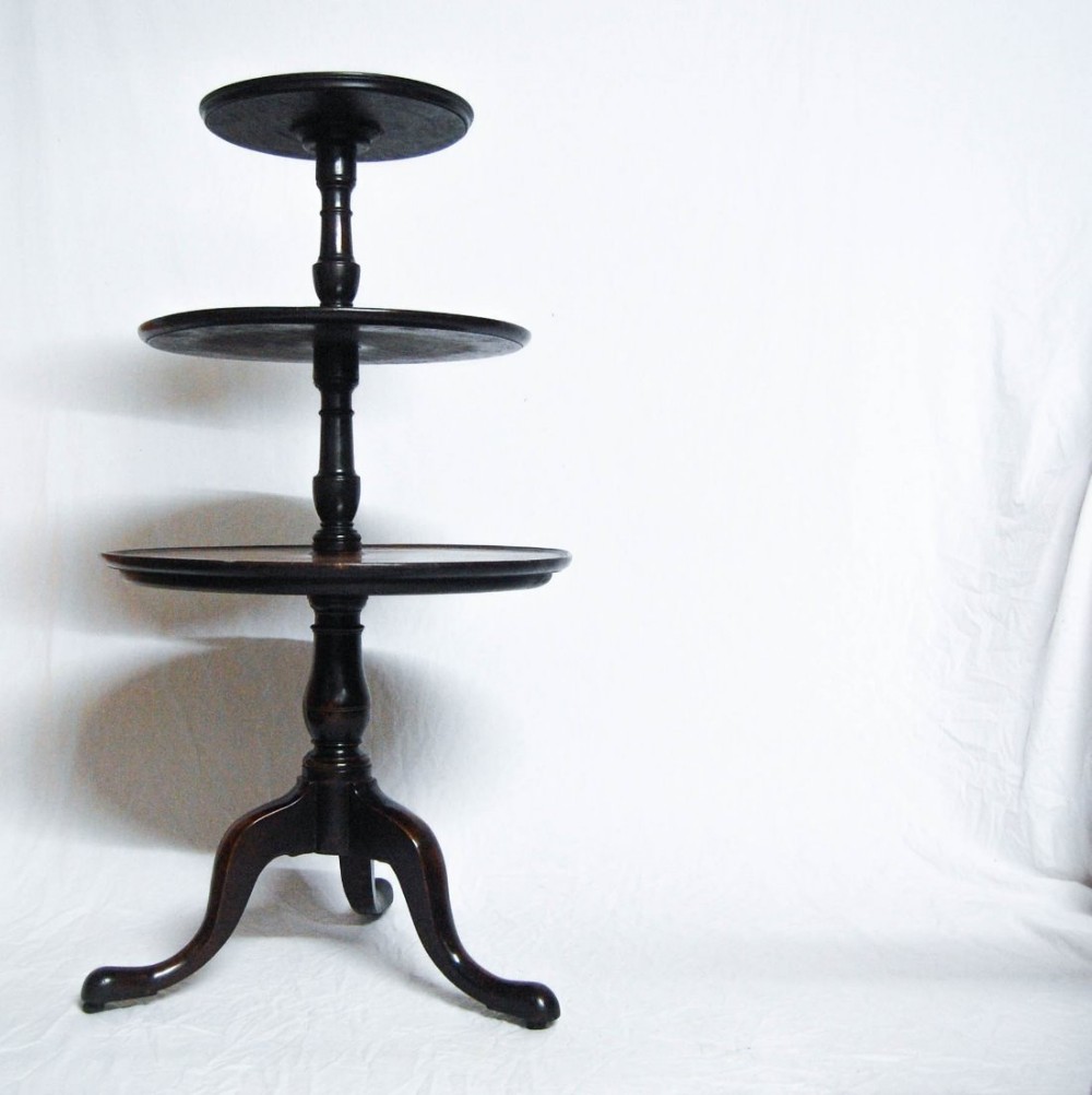 George III Period Cuban Mahogany Three Tire Dumb Waiter with Original Castors